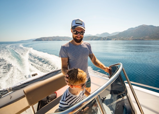 Father and son yachting